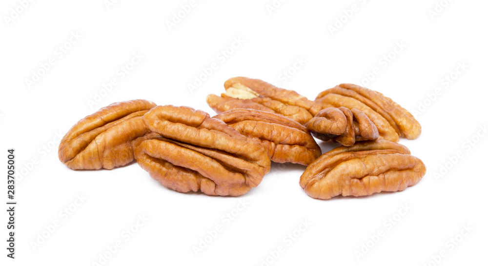 Shelled pecan nuts isolated on white background. Shelled pecan nuts isolated on white background.
