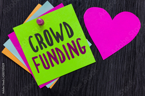 Text sign showing Crowd Funding. Conceptual photo Fundraising Kickstarter Startup Pledge Platform Donations Papers Romantic lovely message Heart Good feelings Wooden background photo