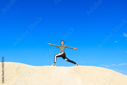Woman doing sports exercises for fitness.