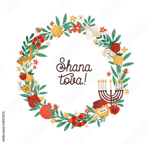 Shana Tova phrase inside round frame or wreath made of leaves, shofar horn, menorah, honey, berries, apples, pomegranates