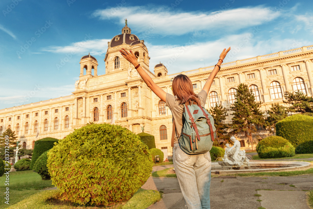 Happy Young asian woman tourist or student near museum of Art History in Vienna