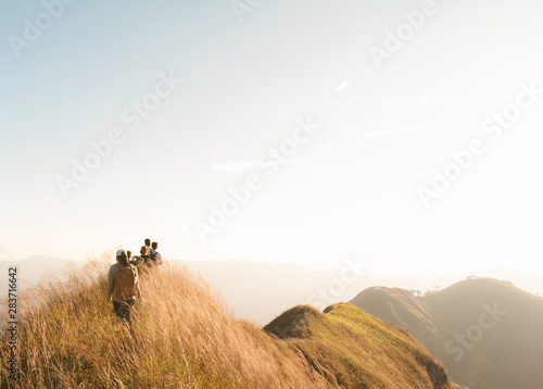 People walking on the top of mountains peak at Khao Chang Phuak Mountain ,Kanchanaburi,Thailand,copy space for text. #283716642