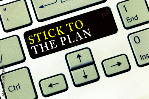 Writing note showing Stick To The Plan. Business photo showcasing To adhere to some plan and not deviate from it Follow.