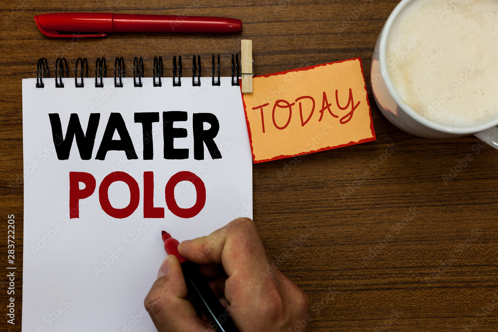 Text sign showing Water Polo. Conceptual photo competitive team sport played in the water between two teams Man holding marker notebook clothespin reminder wooden table cup coffee Text sign showing Water Polo. Conceptual photo competitive team sport played in the water between two teams Man holding marker notebook clothespin reminder wooden table cup coffee