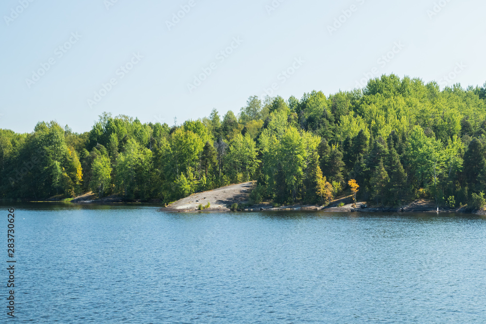 Small rocky island in lake Saimaa, near lappeenranta, Finland.