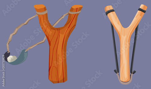 Canvas-taulu Wooden slingshot with stone bullet