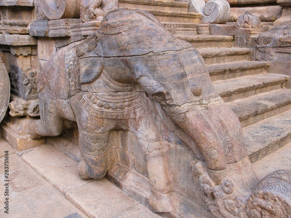 Carved elephant on the balustrade at entrance to Airavatesvara Temple, Darasuram, Tamil Nadu, India. One of the Great Living Chola Temples, a UNESCO World Heritage Center.