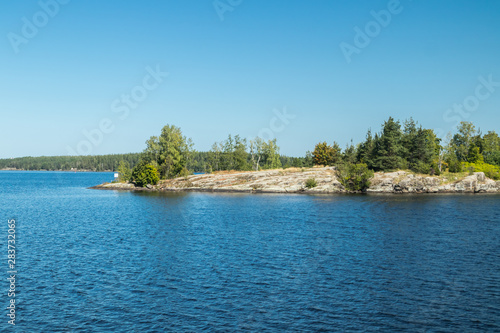 Small rocky island in lake Saimaa, near lappeenranta, Finland.
