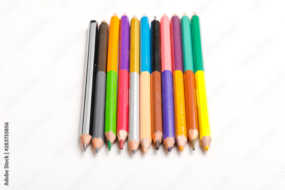 The concept of the teacher's day, School stationery, pencil, pen, note, Spectacles, tie in pen box on white background The concept of the teacher's day, School stationery, pencil, pen, note, Spectacles, tie in pen box on white background