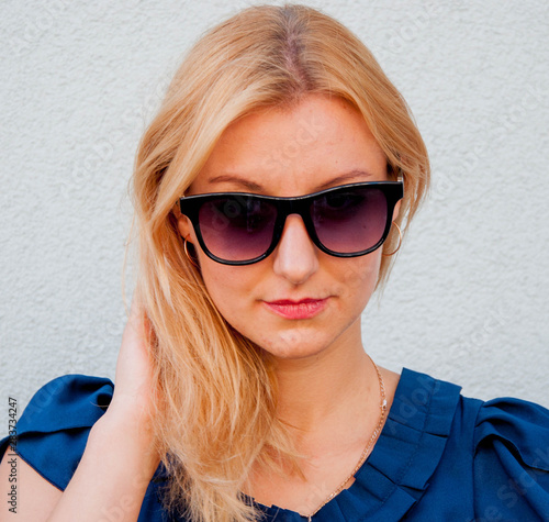 Beautiful Caucasian Blonde Girl Posing Outdoors