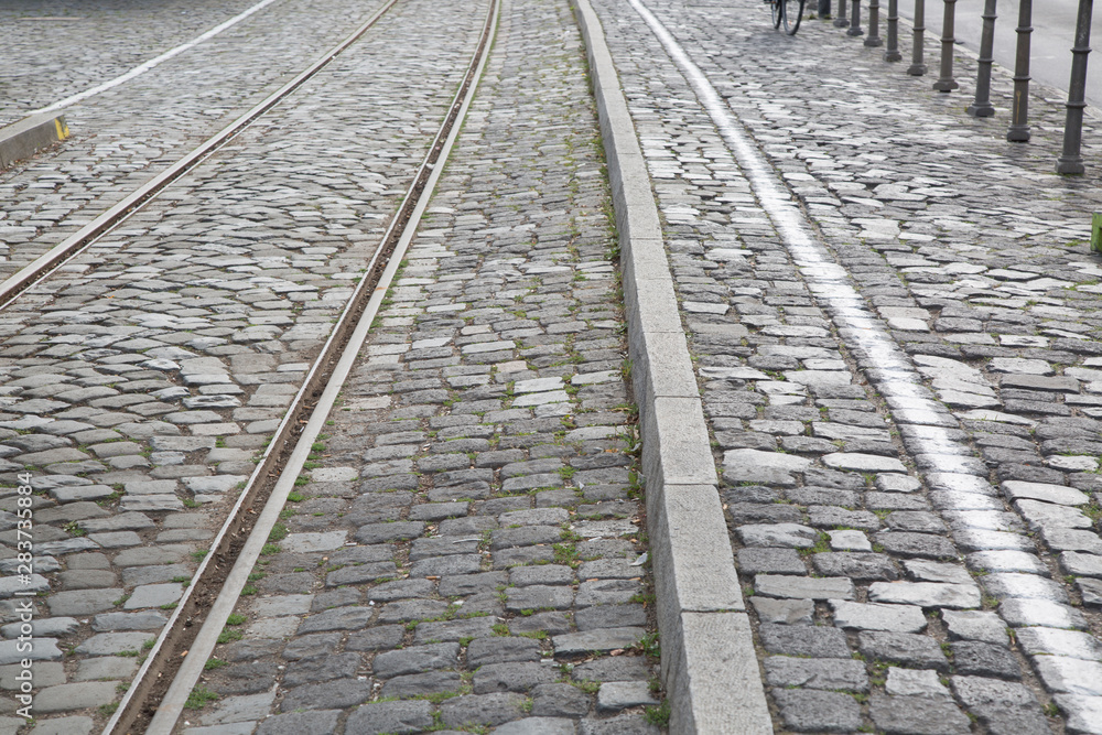 Railway Track and Cyclist on Cobblestones, Frankfurt Railway Track and Cyclist on Cobblestones, Frankfurt