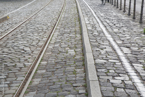Railway Track and Cyclist on Cobblestones, Frankfurt