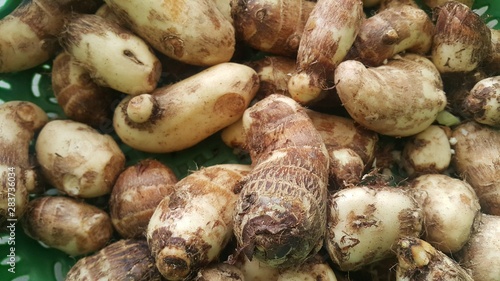 Closeup view of taro vegetable pile for sale in market