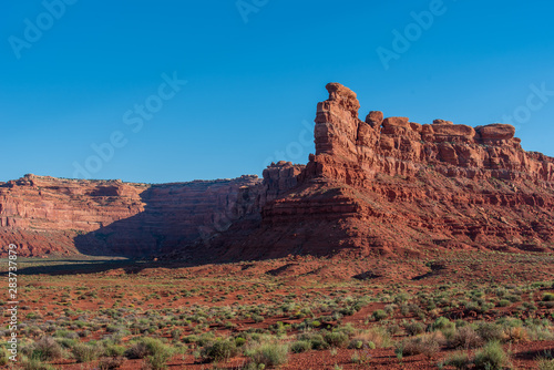 Landscape of large red buttes and monoliths at Valley of the Gods in Utah