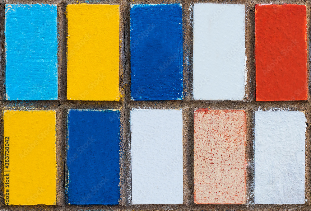 Fototapeta premium seamless background of large colored tiles on the wall