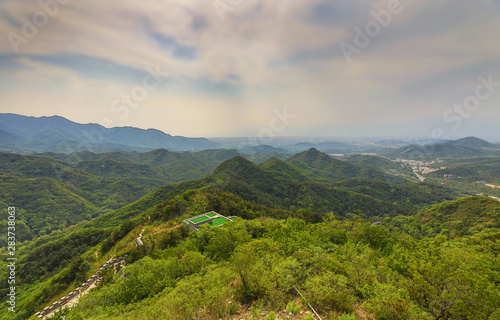 Great Wall of China in summer landscape. 