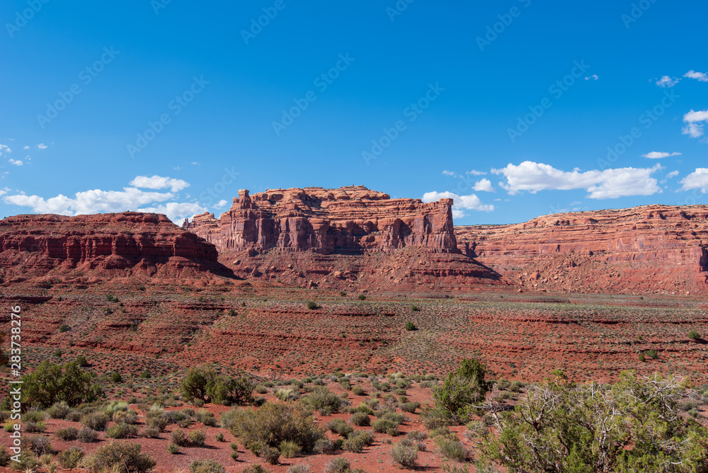 Landscape of large red buttes and monoliths at Valley of the Gods in Utah Landscape of large red buttes and monoliths at Valley of the Gods in Utah