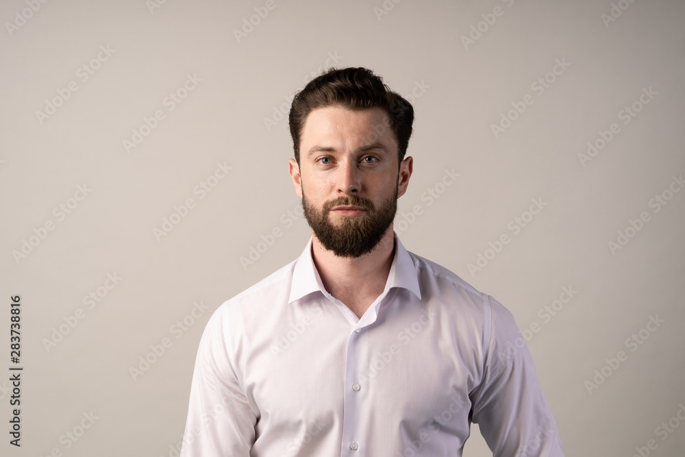 Nice american guy with a beard on a white background, outside, in shirt. Cool beard and mustashe. Nice american guy with a beard on a white background, outside, in shirt. Cool beard and mustashe.