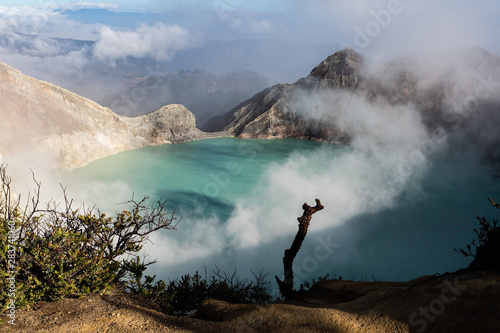 Aerial view of beautiful Ijen volcano with acid lake and sulfur gas going from crater, Indonesia © stryjek