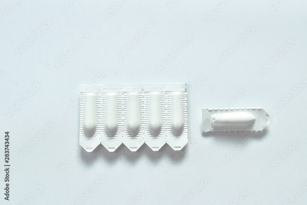 Fototapeta premium corticosteroid cream for hemorrhoid therapy used by insert in bottom hole packing on white background
