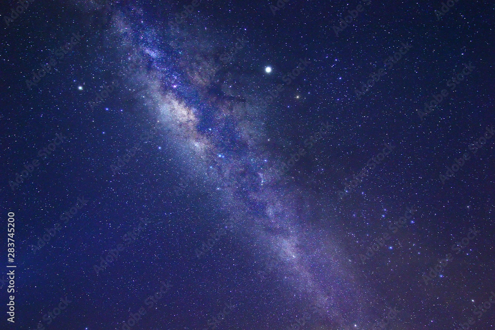 Clearly Milky Way Galaxy at night sky. Image contains grain, noise, blur and soft focus due to high ISO, Long Exposure and Wide Aperture.