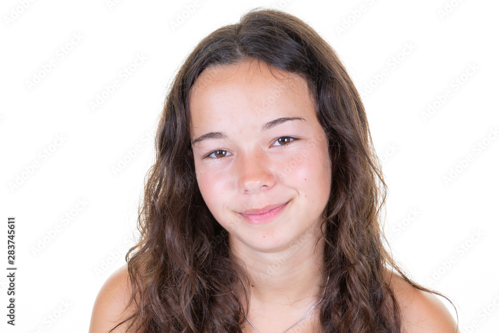Portrait of young beautiful cute cheerful teenager girl smiling looking at camera over white background Portrait of young beautiful cute cheerful teenager girl smiling looking at camera over white background