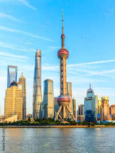 Shanghai city landscape during the day and Huangpu River photo