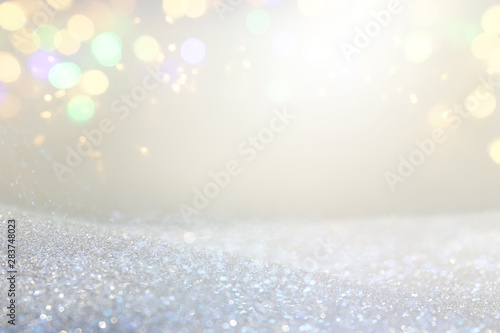 blackground of abstract glitter lights. silver and gold. de-focused © tomertu