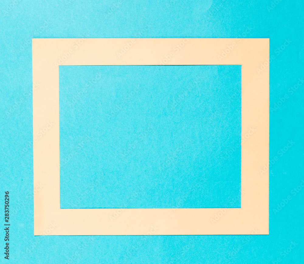 Fototapeta premium Top view beige decorative frame