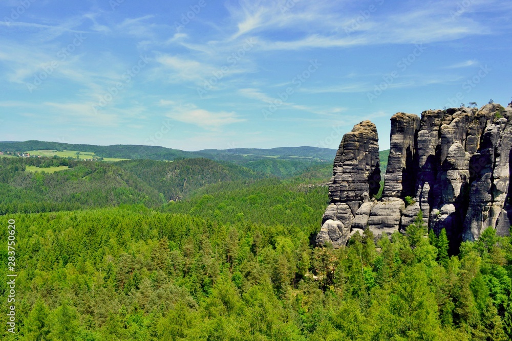 Spectacular sandstone towers seated in the beautiful nature of the Saxon Switzerland, Germany.