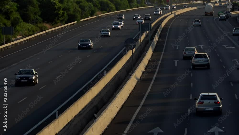 4K. Ultra HD. Aerial view of vehicles traveling the road under the afternoon light. Safe driving on the road. Engravings in the round trip. Holidays. 4K. Ultra HD. Aerial view of vehicles traveling the road under the afternoon light. Safe driving on the road. Engravings in the round trip. Holidays.