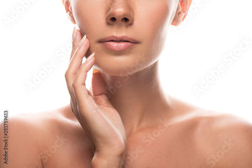 cropped view of naked young woman touching face isolated on white