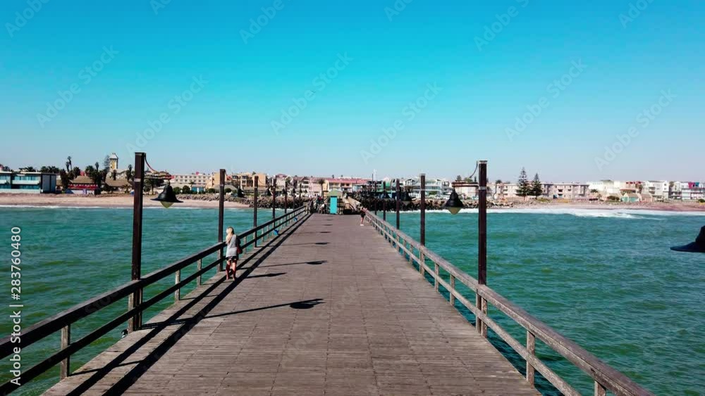 4K view of Swakopmund, Namibia from the ocean pier. Swakopmund shoreline. Pier in the ocean. 4K view of Swakopmund, Namibia from the ocean pier. Swakopmund shoreline. Pier in the ocean.