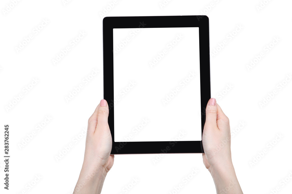 Tablet computer in female hands isolated on white background Tablet computer in female hands isolated on white background