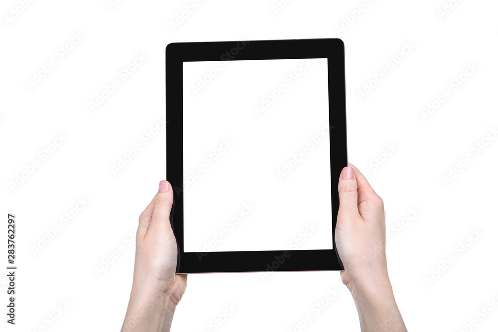 Tablet computer in female hands isolated on white background Tablet computer in female hands isolated on white background