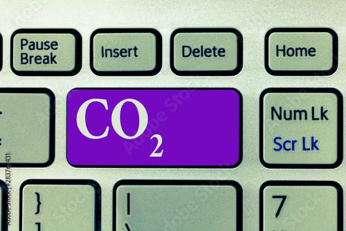 Word writing text Co2. Business concept for Noncombustible greenhouse gas that contributes to global warming. photo