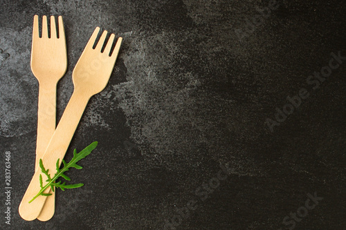 cutlery craft, rustic tableware, used for eating or eco serving (paper fork, plate - set). food background. copy space