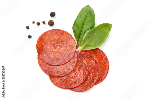 Chorizo sausage slices, Traditional spanish sausage, isolated on white background photo