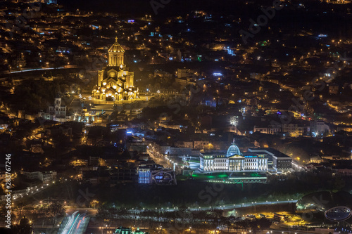 Night view of Tbilisi with Sameba  Trinity  Church and other landmarks. Travel.