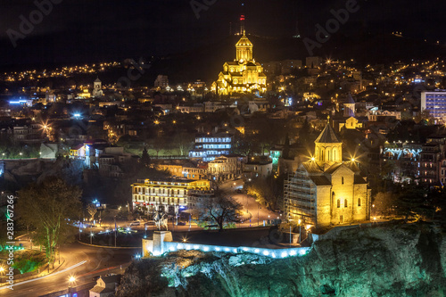 Night view of Tbilisi with Sameba (Trinity) Church and other landmarks. Travel. © k_samurkas