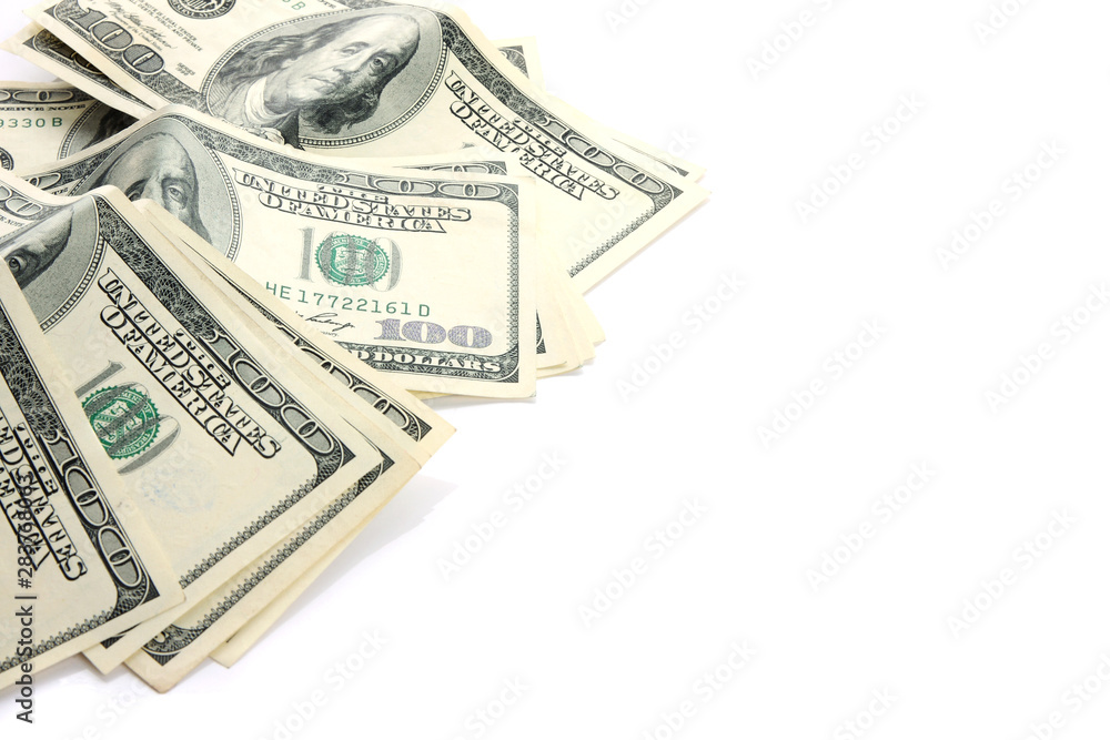 A lot of one hundred dollar bills isolated on white A lot of one hundred dollar bills isolated on white