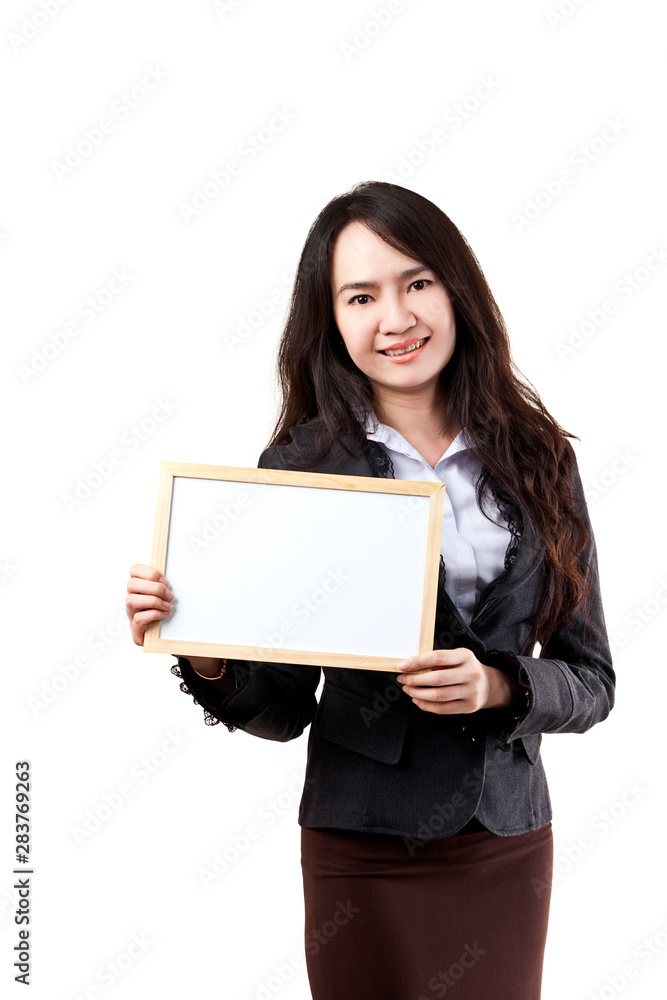 Business woman holding a blank white board Business woman holding a blank white board