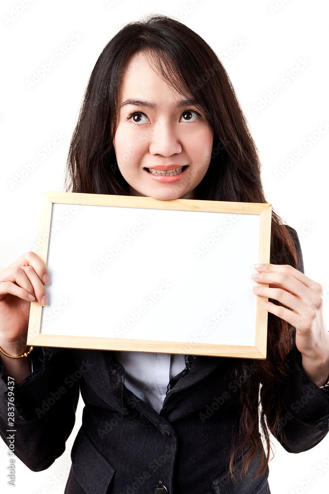 Business woman holding a blank white board Business woman holding a blank white board