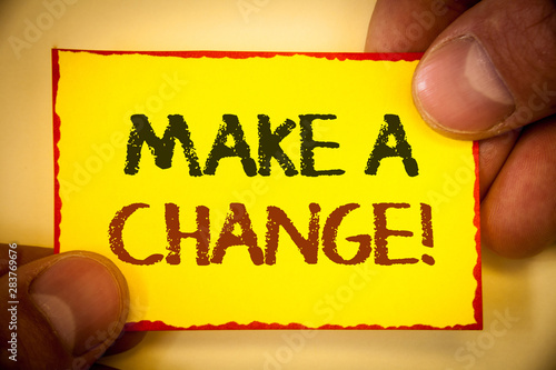 Writing note showing Make A Change Motivational Call. Business photo showcasing New Goals Opportunities Different Approach Text Words yellow paper red border fingers holding corner messsage photo