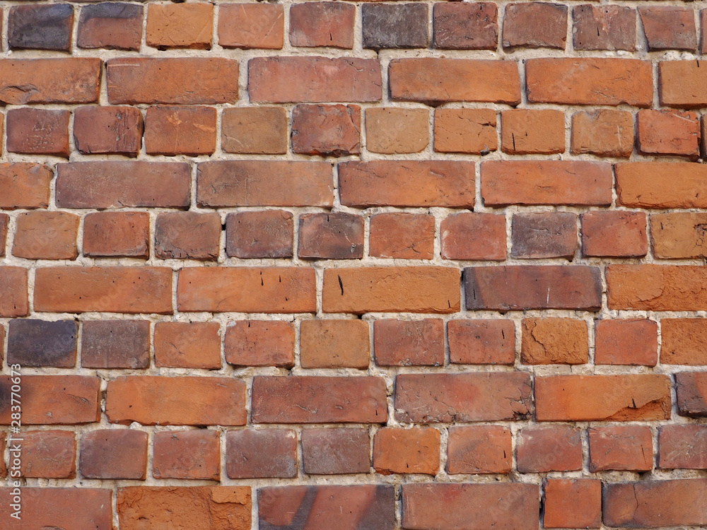 Obraz premium Weathered old brick wall