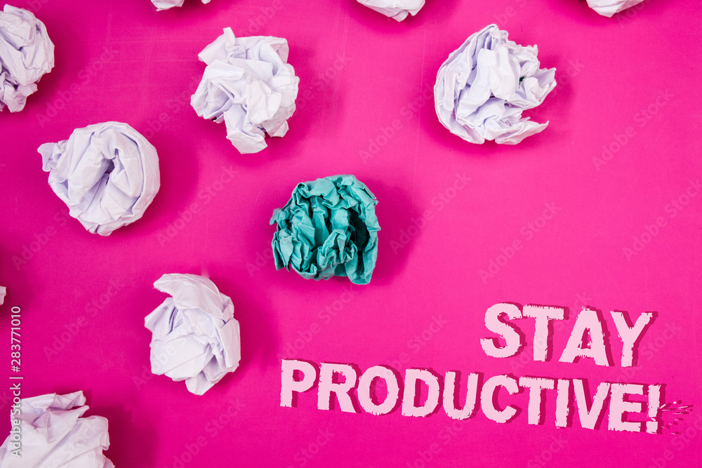 Text sign showing Stay Productive Motivational Call. Conceptual photo Efficiency Concentration Productivity Text Words pink background crumbled paper notes white blue stress angry