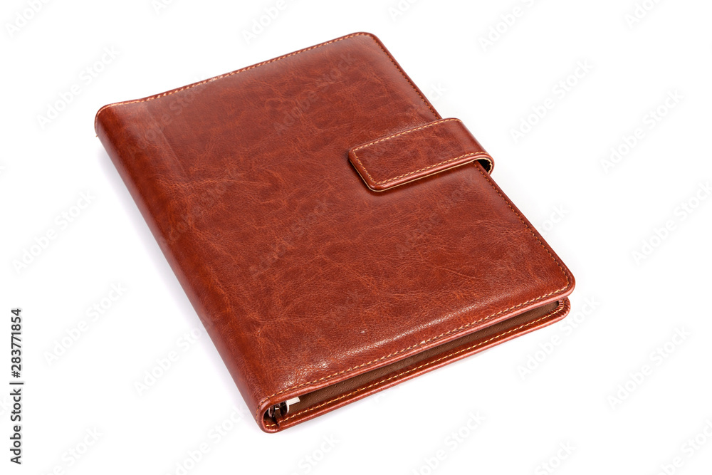 Brown leather notebook on a white background Brown leather notebook on a white background