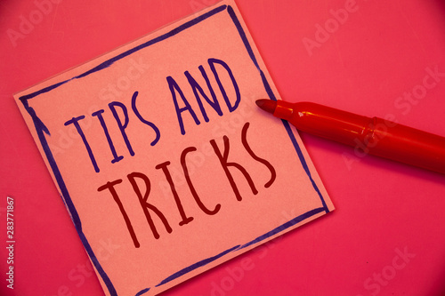 Writing note showing Tips And Tricks. Business photo showcasing Suggestions to Make things easier Helpful Advices Solutions Ideas concepts intentions on pink paper black letters frame red pen