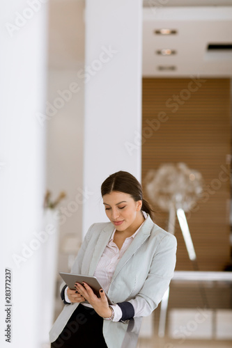 Young woman with a tablet i...