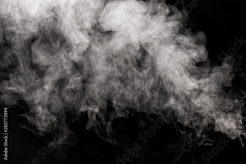 Movement of smoke on black background.